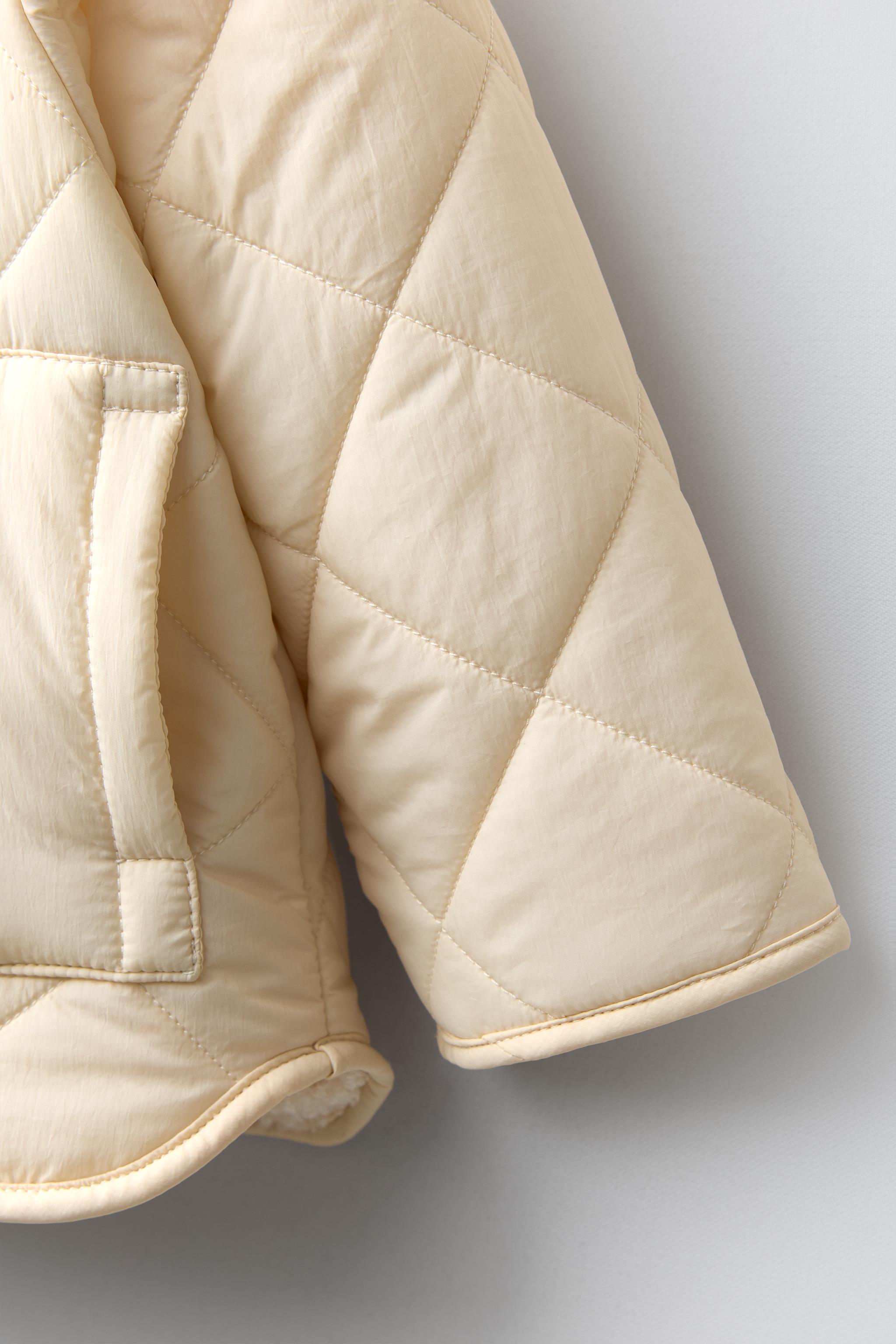 BLOUSON EN NYLON DÉPERLANT AVEC DOUBLURE MOUTONNÉE